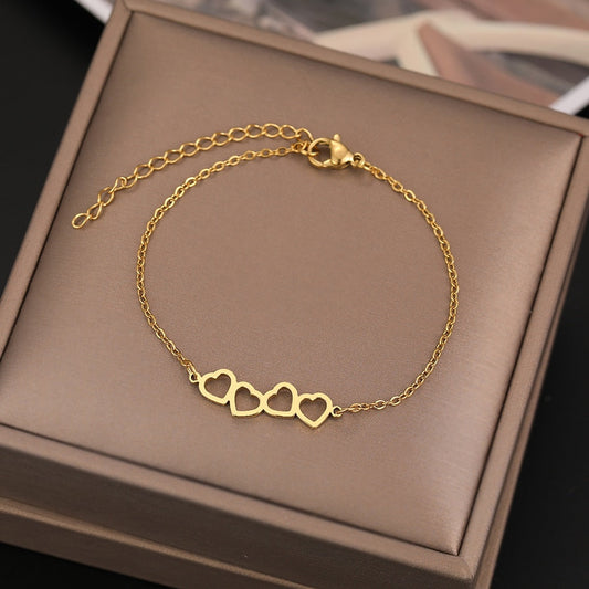 Bijoux acier inoxydable quatre coeur