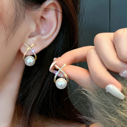 Boucle d'oreille fantaisie forme x perles