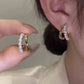 Boucle d'oreille fantaisie forme x perles